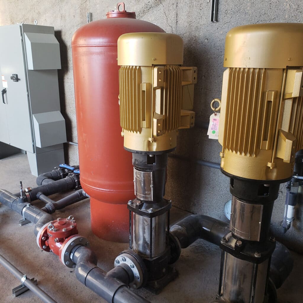 Surface Water Discharge Page Gold Pumps With Red Water Container And Exposed Plumbing 022521 Surface Water Discharge