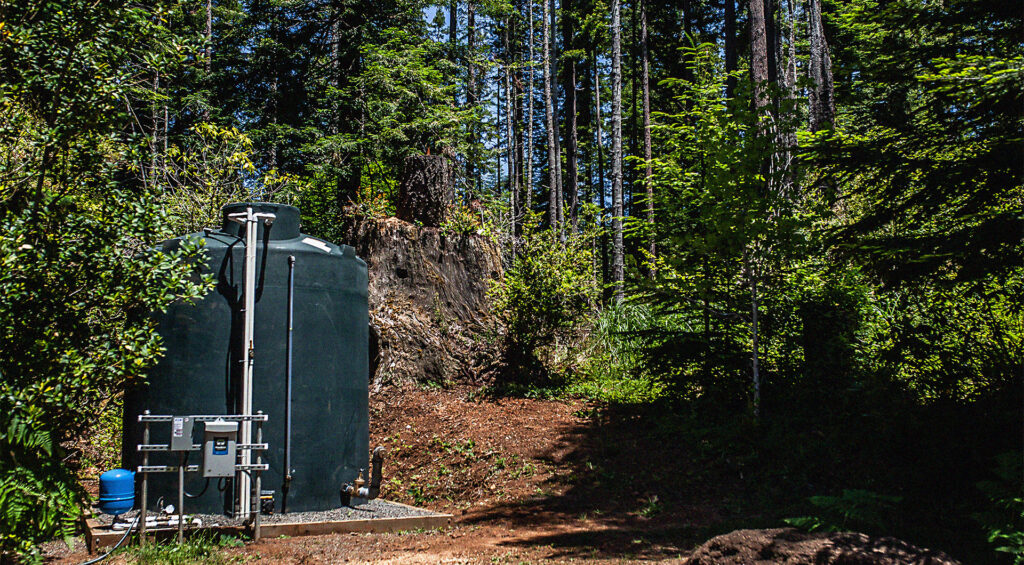 Water Storage Tank In The Woods